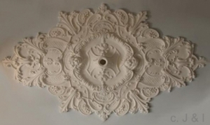 rozet, ornament, gips, ovaal, www.gipsenbeton.nl